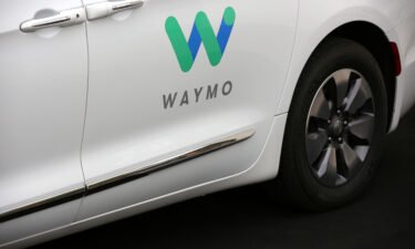 A Waymo Chrysler Pacifica Hybrid self-driving vehicle is displayed during a demonstration in Chandler