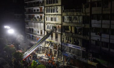 Firefighters and rescue workers are seen here at the site of an explosion in Dhaka