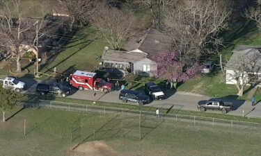 Three children were found dead in a Texas home on March 3. Authorities are seen at the home where the siblings were found.