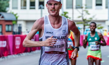 Robertson competes in the Olympic marathon in Sapporo