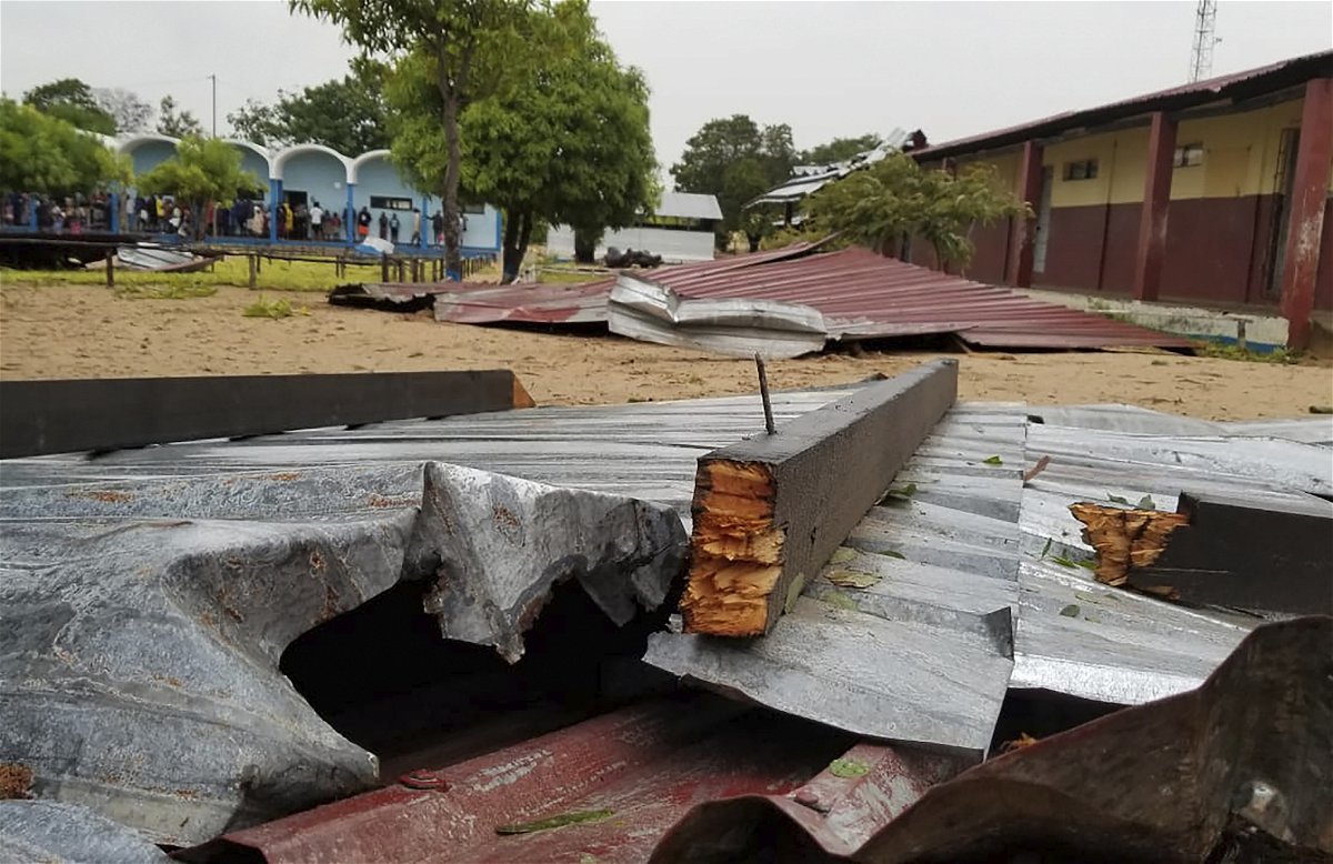 <i>AP</i><br/>The damaged roof of a school lies in the playground in Vilanculos
