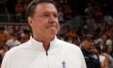 Kansas Jayhawks head coach Bill Self stands on the court after losing to Texas on March 4