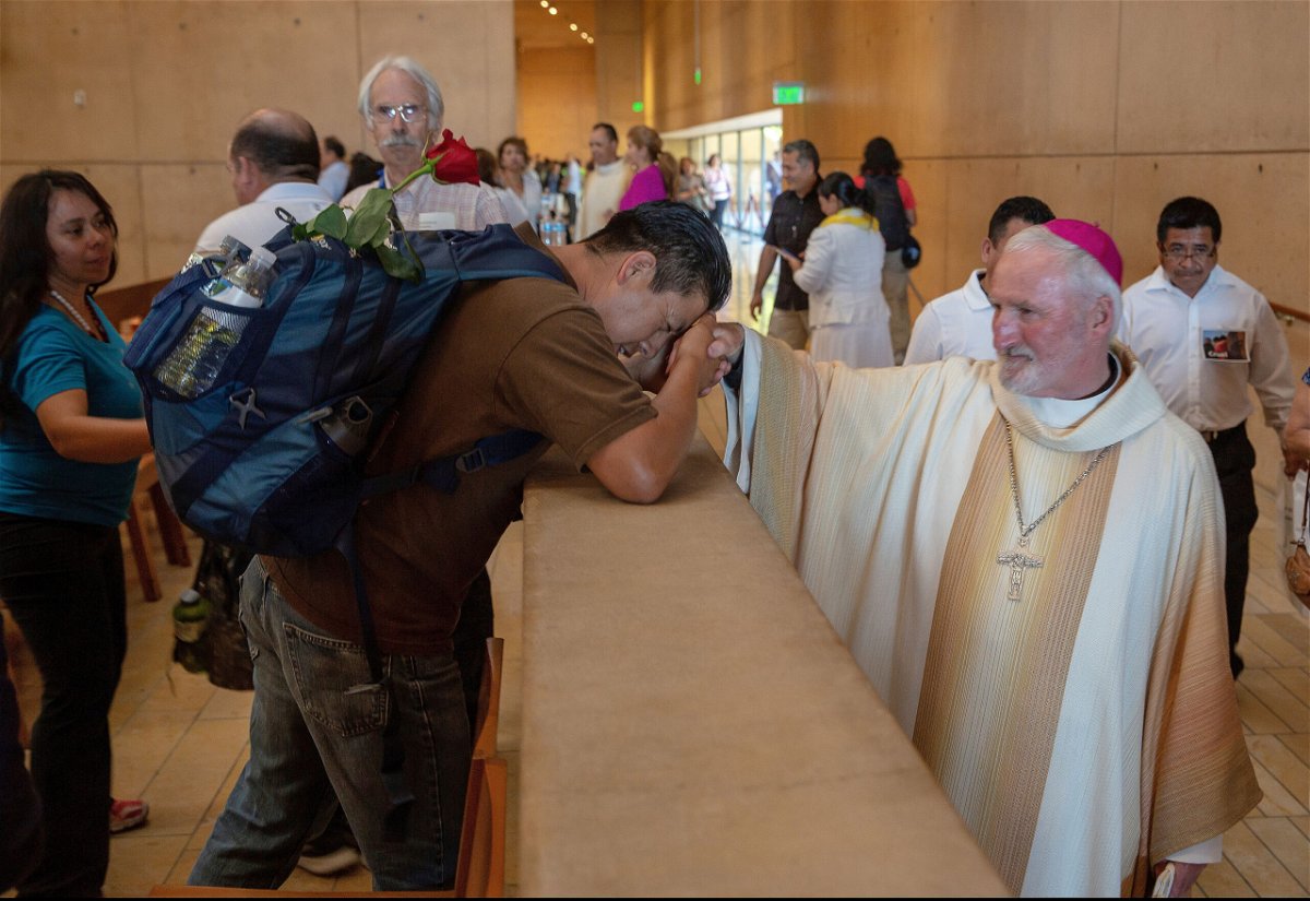 <i>Damian Dovarganes/AP</i><br/>Auxiliary Bishop David O'Connell (right) is seen here at a Mass in the Los Angeles Cathedral of Our Lady of Angels in June 2018.