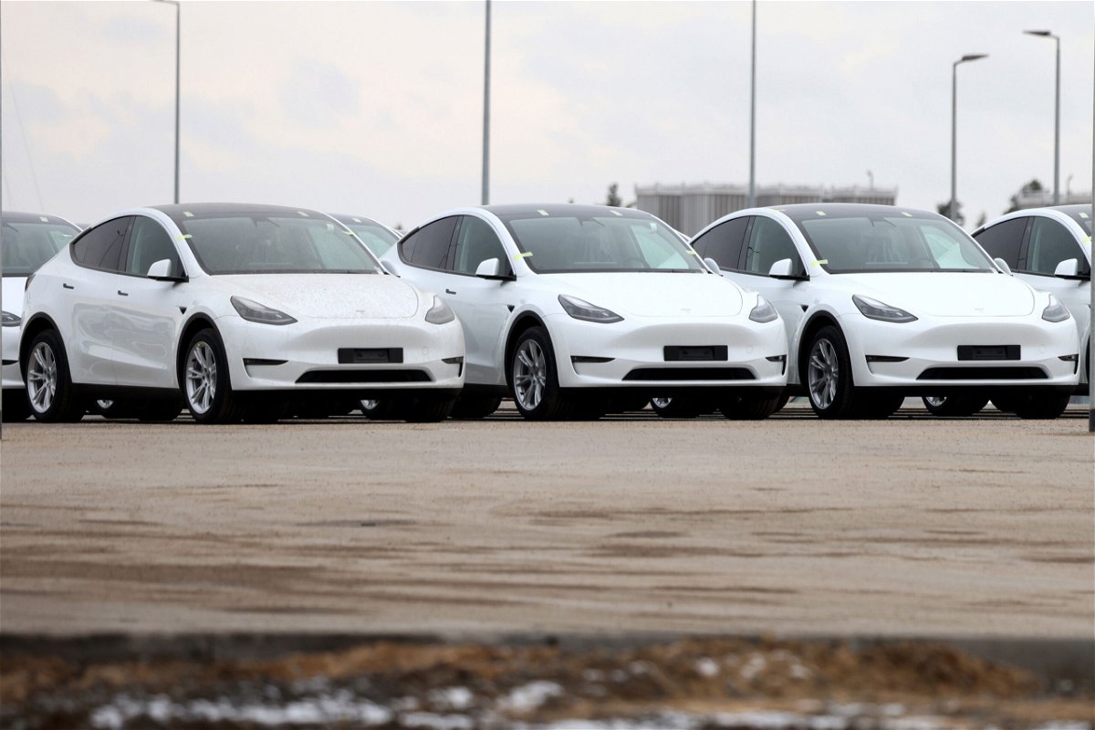 <i>Liesa Johannssen/Bloomberg/Getty Images</i><br/>Tesla Model Y electric vehicles are seen parked at the Tesla Inc. Gigafactory in Gruenheide