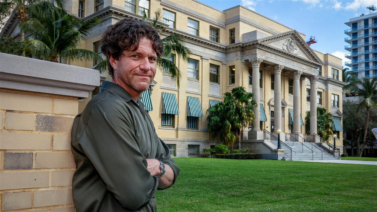 <i>Damon Higgins/Palm Beach Post/USA Today Network</i><br/>Former Palm Beach Atlantic University English Professor Samuel Joeckel stands in front of the Palm Beach Court House in Florida on February 20.