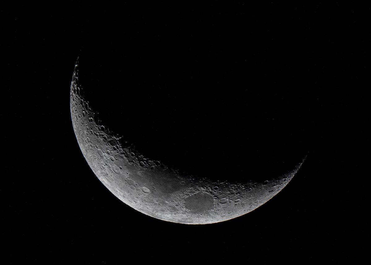 <i>Luis Acosta/AFP/Getty Images</i><br/>The waxing crescent moon is seen from Panama City on March 25.