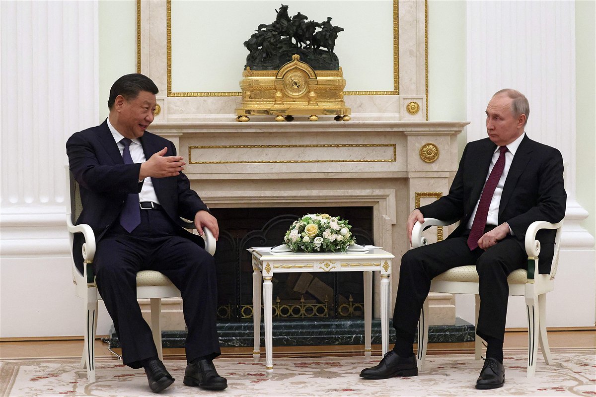 <i>Sergei Karpukhin/Sputnik/AFP/Getty Images</i><br/>Russian President Vladimir Putin meets with Chinese leader Xi Jinping at the Kremlin in Moscow Monday