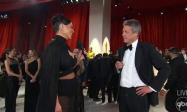 Hugh Grant is interviewed on the red carpet by Ashley Graham in a video that went viral from the 2023 Oscars.