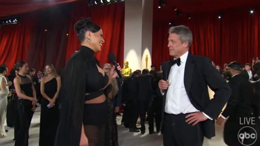 <i>ABC</i><br/>Hugh Grant is interviewed on the red carpet by Ashley Graham in a video that went viral from the 2023 Oscars.