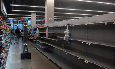 A water aisle is barren at Giant Supermarket in Philadelphia on March 26.