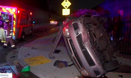 <i>KGTV</i><br/>A bystander helped rescue a woman after her car crashed into a fire hydrant and rolled over multiple times in San Diego early Wednesday morning. The wreck occurred just after 3:20 a.m. on Kettner Boulevard