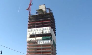 A worker was taken to the hospital after falling from the 26th floor to the 24th floor at a downtown construction site Wednesday morning