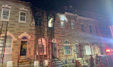 Three children remain hospitalized Sunday night after a rowhome fire in southwest Baltimore