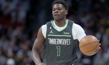 Anthony Edwards of the Minnesota Timberwolves brings the ball down the court against the Denver Nuggets in the NBA Playoffs at Ball Arena on April 25 in Denver.