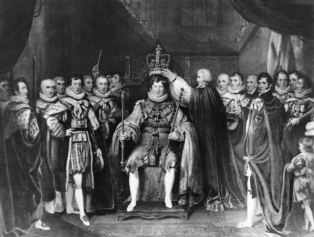 <i>Corbis Historical/Getty Images</i><br/>Courtiers stand beside and place the crown on King George IV