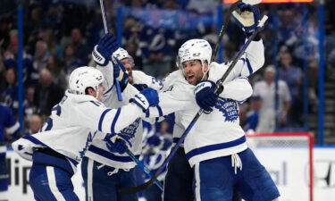 John Tavares (91) celebrates scoring the game-winning goal.