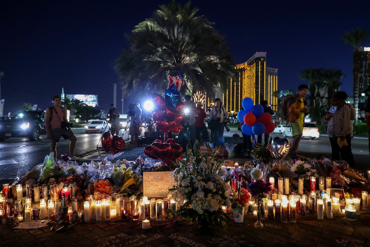 <i>Bilgin S. Sasmaz/Anadolu Agency/Getty Images/FILE</i><br/>A makeshift memorial grew along the Las Vegas Strip for the victims of the mass shooting on October 5