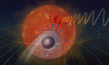 This illustration depicts plasma emitted by a star deflected by the magnetic field of the exoplanet orbiting it. The plasma then interacts with the star's magnetic field