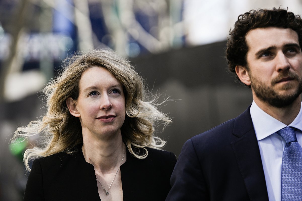 <i>Philip Pacheco/Getty Images</i><br/>Former Theranos CEO Elizabeth Holmes (left) alongside her boyfriend Billy Evans