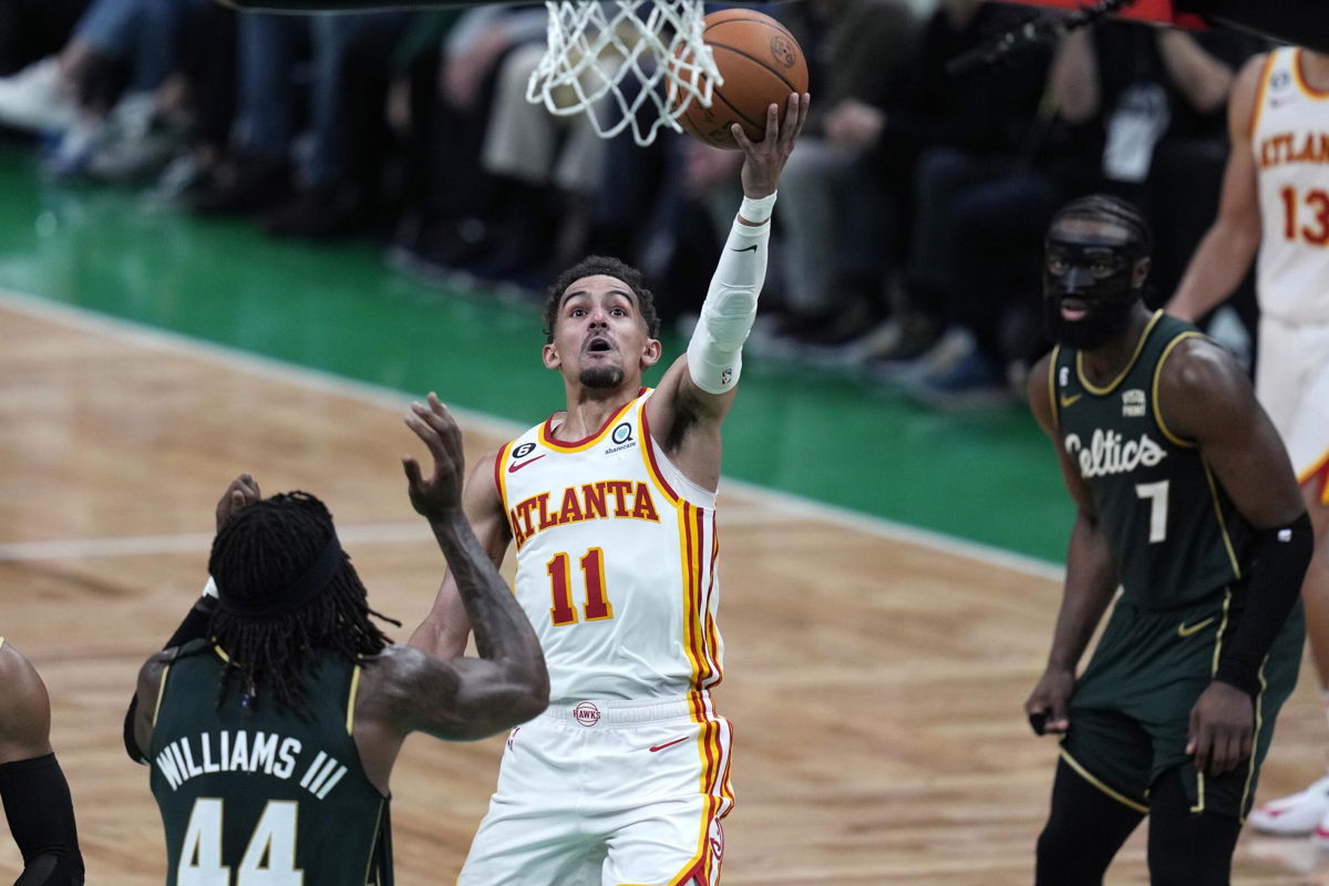 <i>Charles Krupa/AP</i><br/>Trae Young carried the Hawks to victory