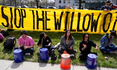 Demonstrators protest against the Biden administration's approval of the Willow Project outside the Interior Department on March 21.