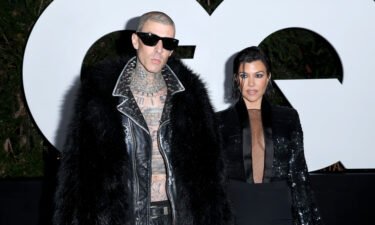 (From left) Travis Barker and Kourtney Kardashian are seen here at the GQ Men of the Year Party in West Hollywood in November 2022.