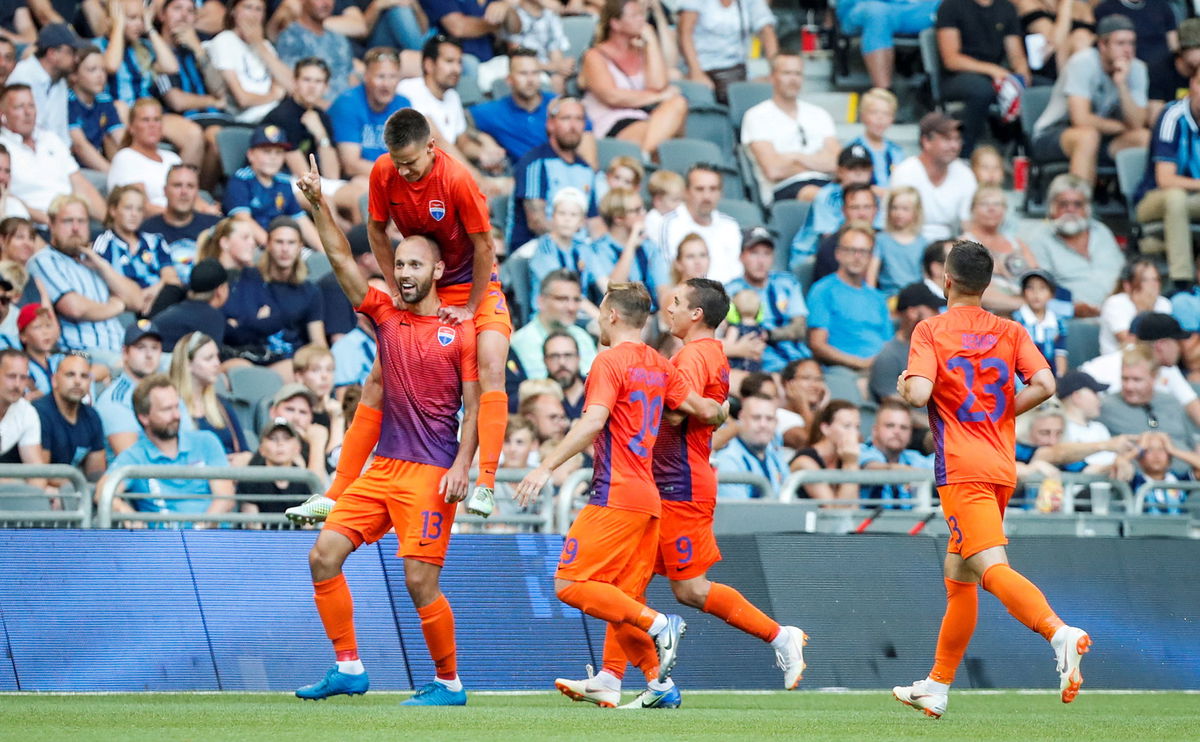 <i>Christine Olsson/TT News Agency/Reuters</i><br/>Mariupol's Sergiy Yavorsky celebrates with his teammates.