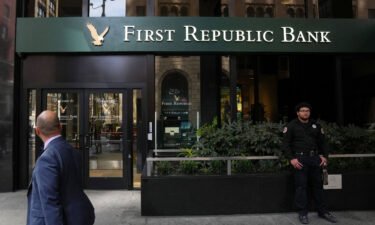 A security guard stands outside a First Republic Bank branch in San Francisco