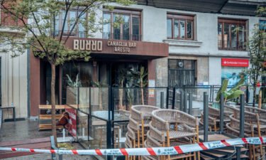 A fire believed to have been started by a flambéed pizza has killed two people and injured 12 others at a restaurant in the Spanish capital Madrid