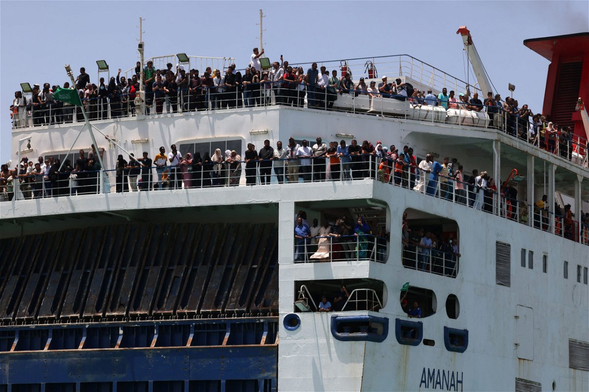 <i>Fayez Nurealdine/AFP/Getty Images</i><br/>Evacuees stand on a ferry as it transports some people across the Red Sea from Port Sudan to the Saudi King Faisal navy base in Jeddah