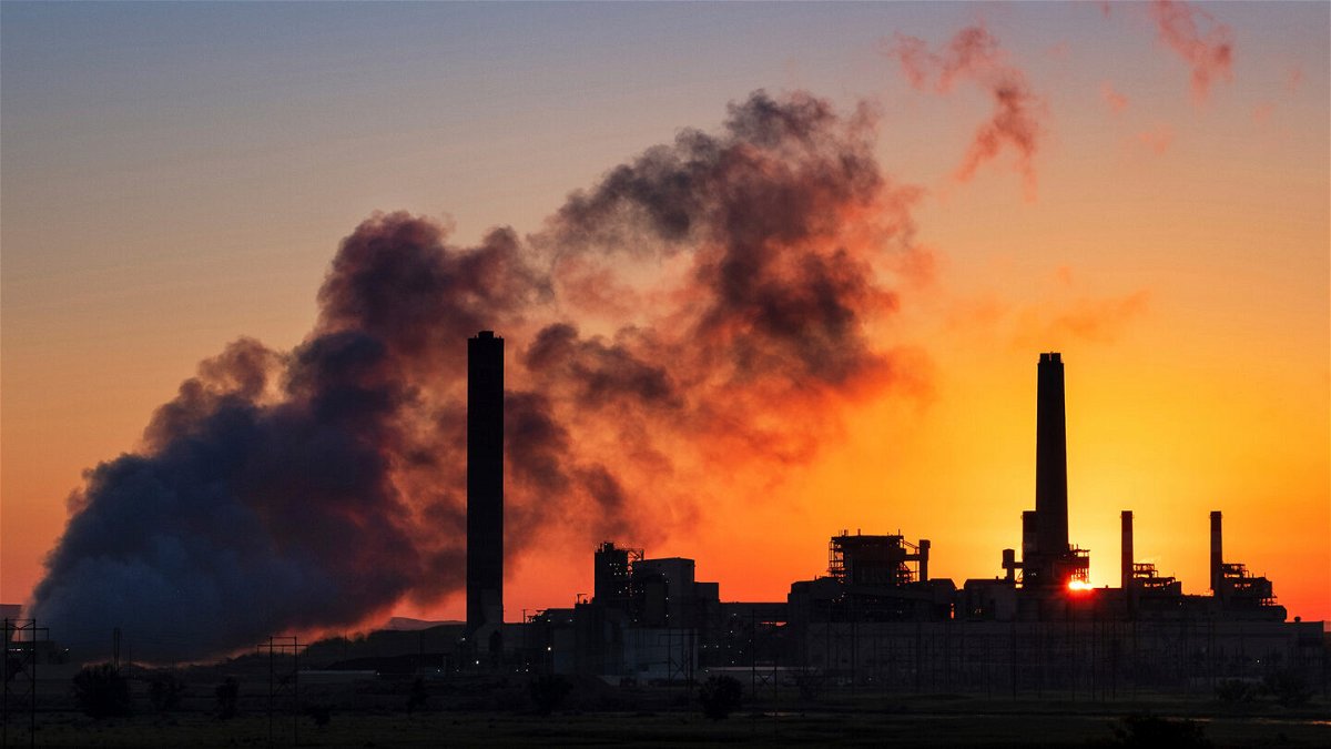 <i>J. David Ake/AP</i><br/>The Dave Johnson coal-fired power plant is silhouetted against the morning sun in Glenrock