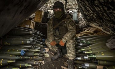 A Ukrainian serviceman is seen at an artillery position in Zaporizhzhia