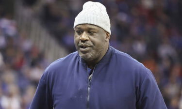 Shaquille O'Neal attends the Big 12 basketball tournament championship game between the Texas Longhorns and Kansas Jayhawks on March 11