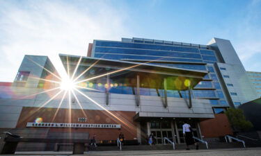 People arrive at the Leonard L. Williams Justice Center as jury selection was adjourned till Monday to decide in a trial whether Fox News should pay Dominion Voting Systems $1.6 billion for spreading election-rigging falsehoods