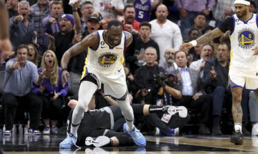 Draymond Green moves away from Domantas Sabonis in the second half of Game 2 between the Golden State Warriors and Sacramento Kings.