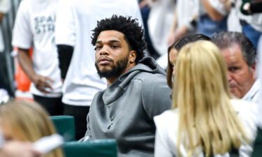 Miles Bridges watches a game at his alma mater