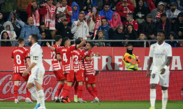 Girona players celebrate Taty Castellanos' fourth goal.