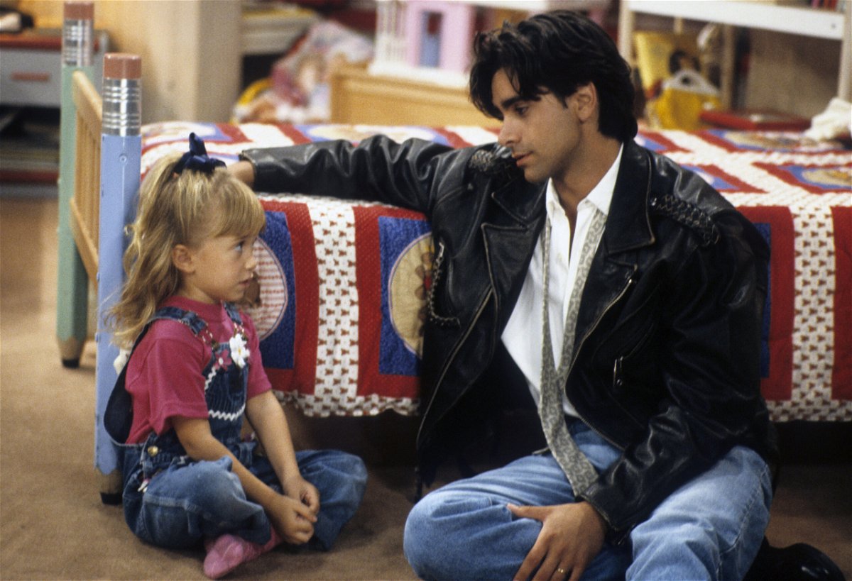<i>ABC Photo Archives/Disney General Entertainment Content/Getty Images</i><br/>Ashley Olsen and John Stamos in 