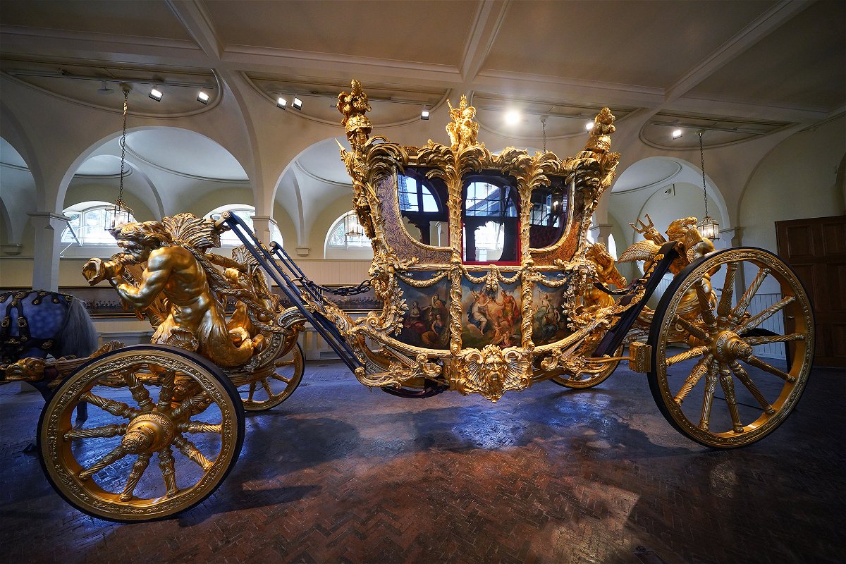 <i>Yui Mok/PA Images/Getty Images</i><br/>The Gold State Coach on display at the Royal Mews in Buckingham Palace