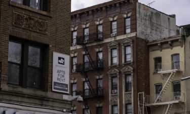 Manhattan median rents hit another high in March. A "For Rent" sign is pictured on an apartment building in the East Village neighborhood of New York