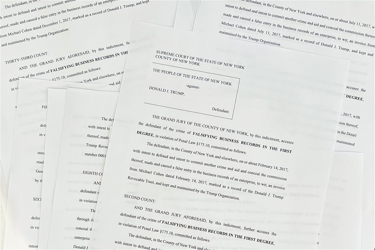 <i>Rebecca Wright/CNN</i><br/>This photo taken on April 4 shows a copy of the unsealed indictment for former President Donald Trump.