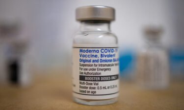 Is the new Covid-19 booster for you? Our medical analyst explains. Pictured is a vial of the Moderna Covid-19 booster vaccine at a pharmacy in Pennsylvania