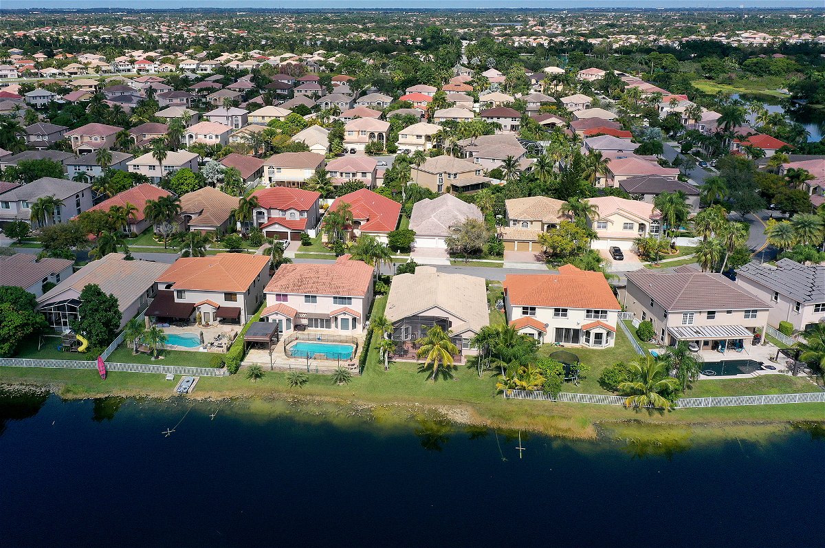 <i>Joe Raedle/Getty Images</i><br/>US home prices rose slightly in February. Pictured is a residential neighborhood in 2022 in Miramar