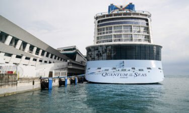 An Australian passenger is believed to have fallen overboard from a Quantum of the Seas cruise ship traveling from Brisbane to Hawaii. A Quantum of the Seas ship is pictured here docked in Singapore in 2020.