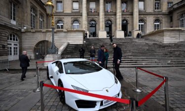 The Lamborghini displayed outside the Palais de Justice in Paris was just one of the confiscated luxury items on offer.