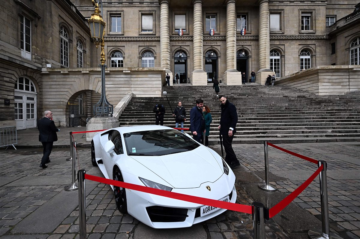 <i>Emmanuel Dunand/AFP/Getty Images</i><br/>The Lamborghini displayed outside the Palais de Justice in Paris was just one of the confiscated luxury items on offer.
