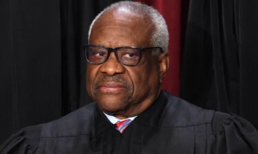 Supreme Court Justice Clarence Thomas said Friday that he did not disclose luxury travel paid for by a Republican donor because he was advised at the time that he did not have to report it.