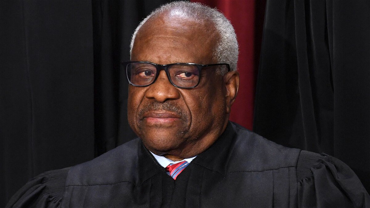 <i>Olivier Douliery/AFP/Getty Images</i><br/>Associate US Supreme Court Justice Clarence Thomas poses for the official photo at the Supreme Court in Washington