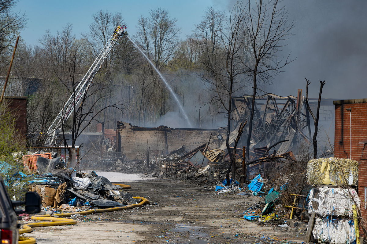 <i>Michael Conroy/AP</i><br/>Firefighters pour water on an industrial fire in Richmond on Wednesday.