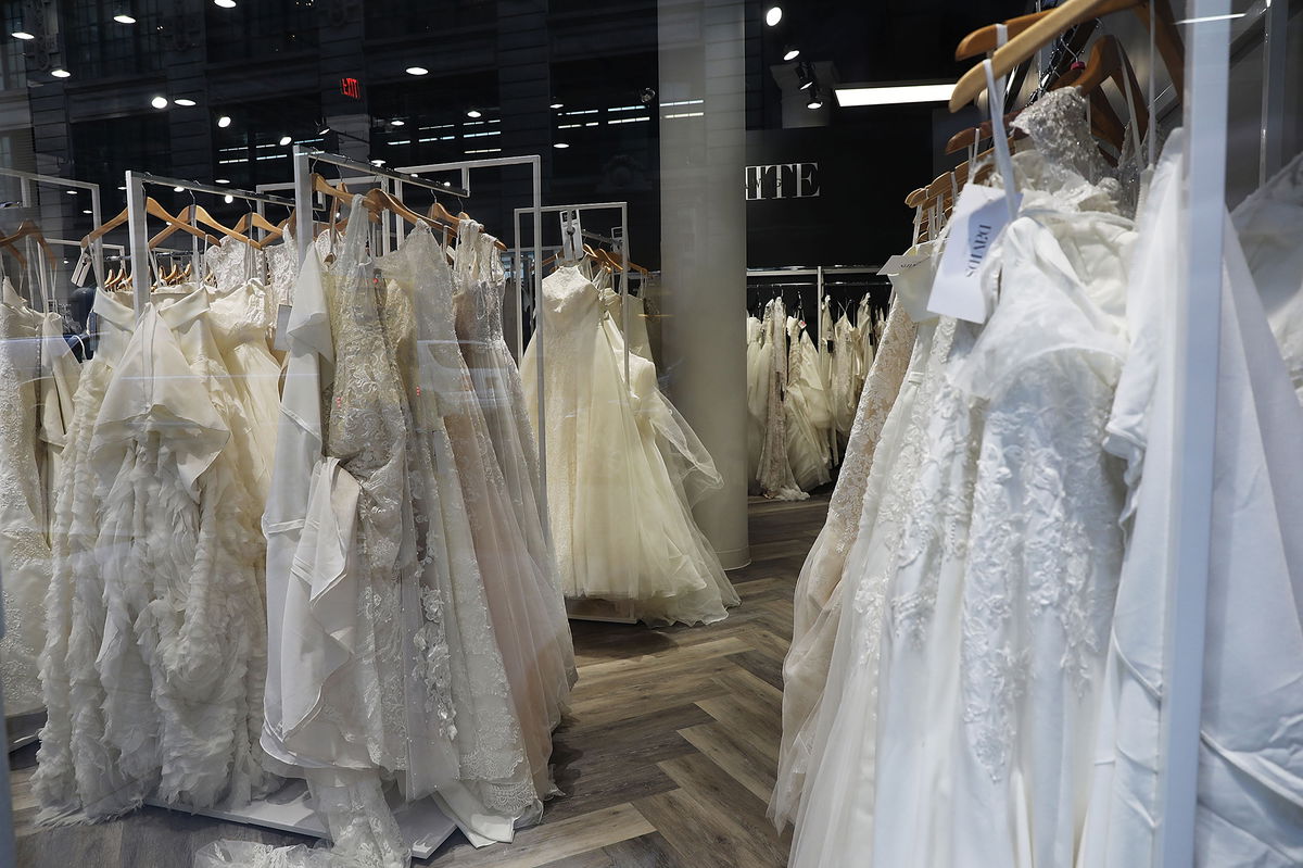 <i>Spencer Platt/Getty Images</i><br/>Wedding dresses are displayed in a window at a David's Bridal store in Manhattan on November 19